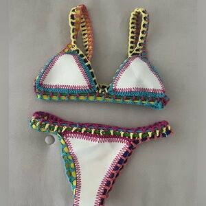 Reversible colorful knit bikini resembling Kinii